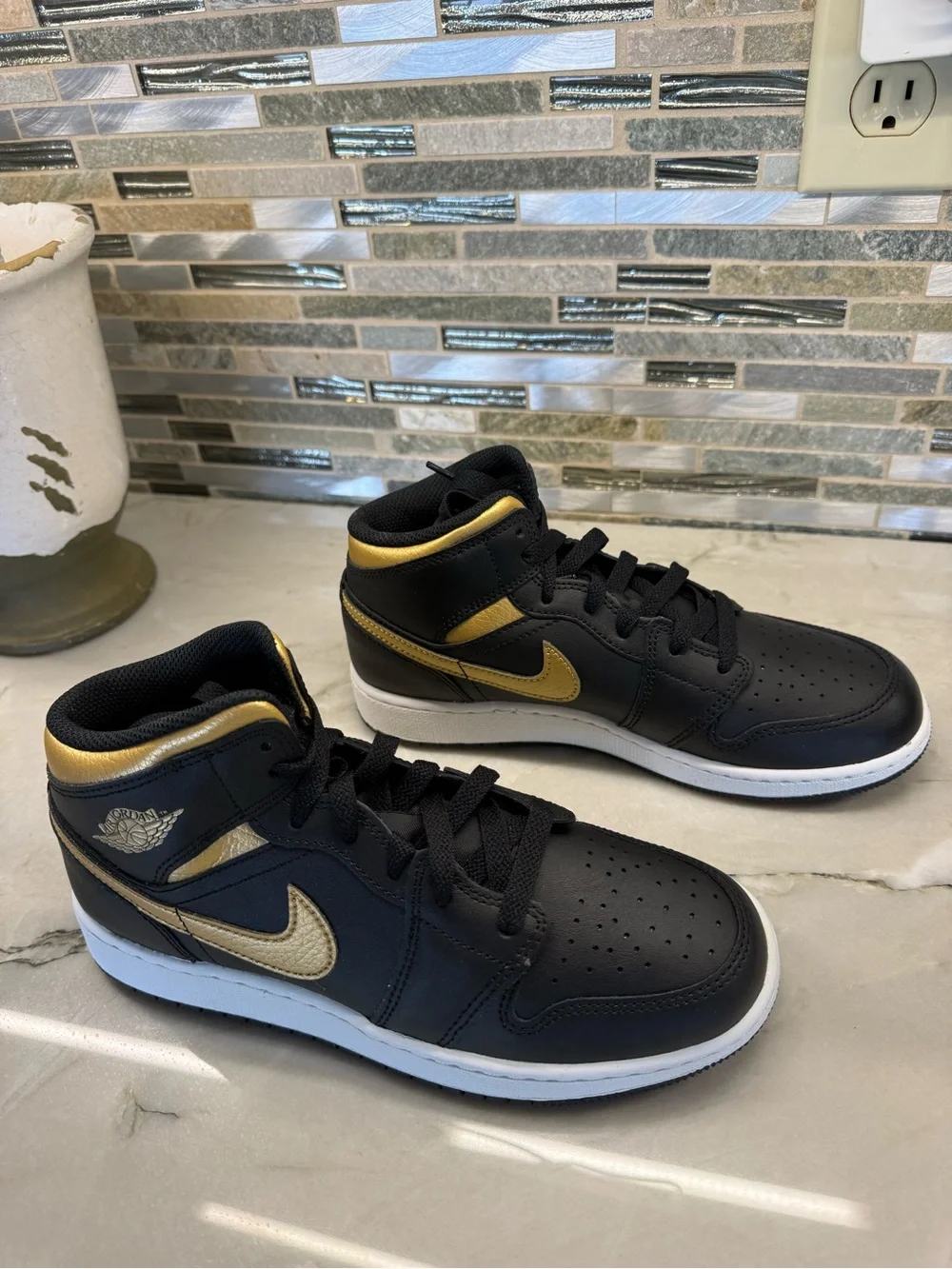 Nike Boy’s Black and Gold Mid-Top Sneakers